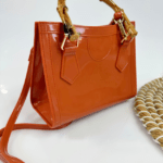 Cartera De Mano Naranja Tipo Charol